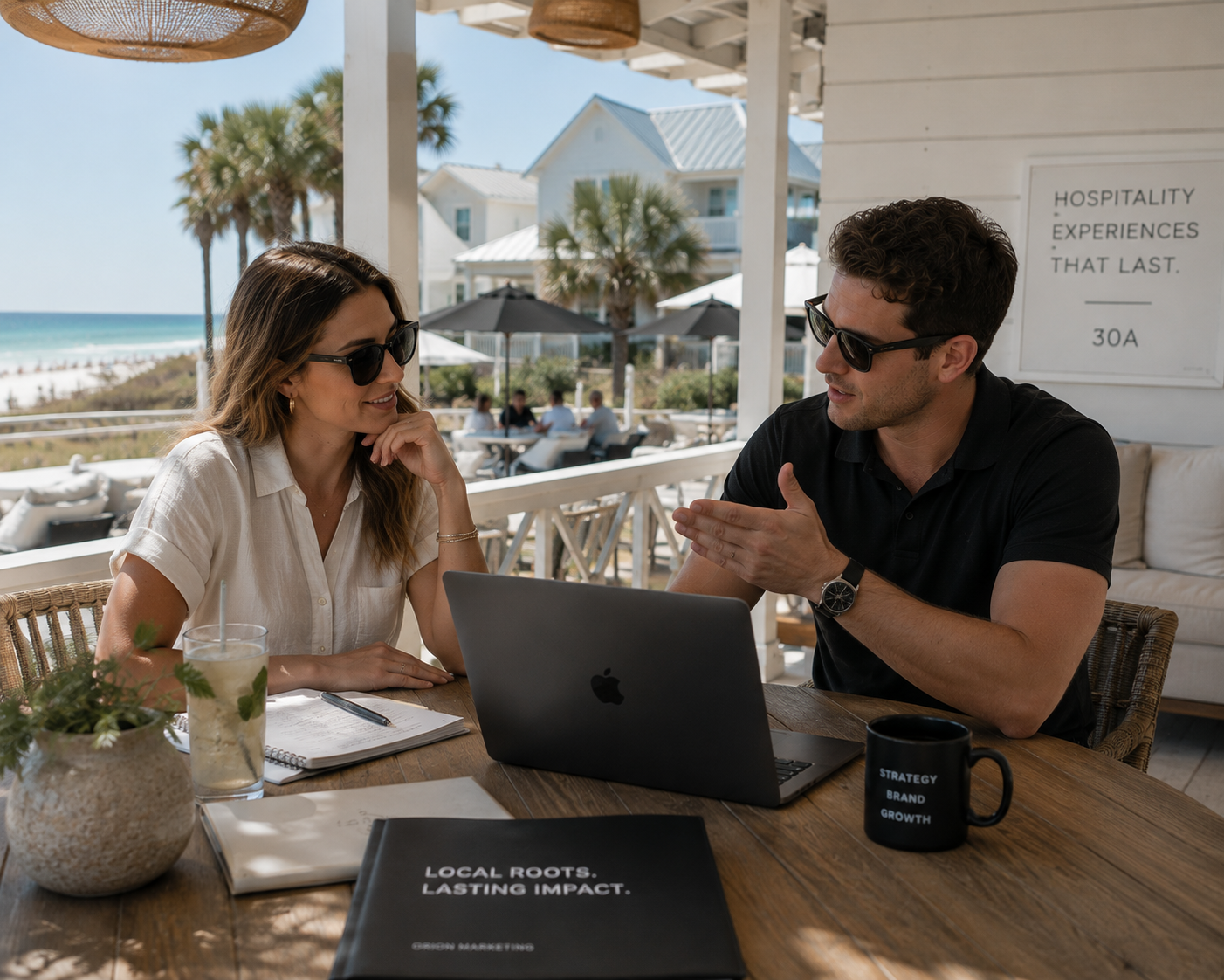 Hospitality consultant meeting with a client at a beachfront property